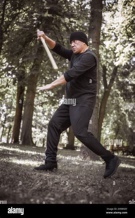 Lameco Astig Combatives instructor demonstrates single stick fighting techniques and training ...