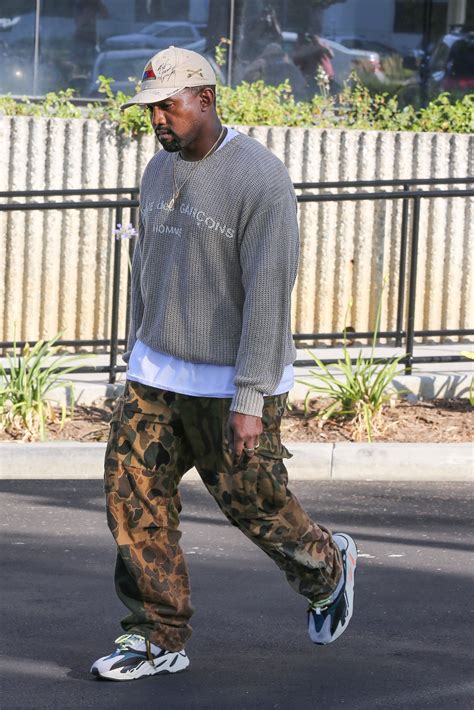 Kanye West wearing Comme des Garçons Sweater, Adidas Yeezy Wave Runner 700 | Kanye west style ...