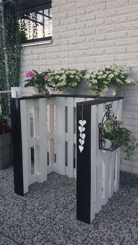 Outdoor Pallet Table with Blooming Flowers