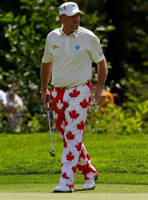 John Daly, of the U.S., wears Canadian flag pants as ...