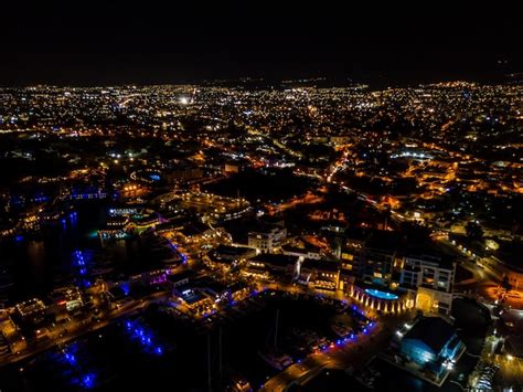 Premium Photo | Aerial view of night marina port with yachts