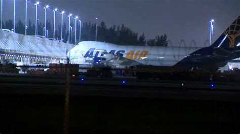 VIDEO: Sparks fly from cargo plane prompting emergency landing in Miami