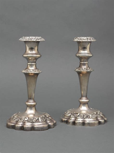 Pair of Silver Candlesticks - Shapiro Auctioneers