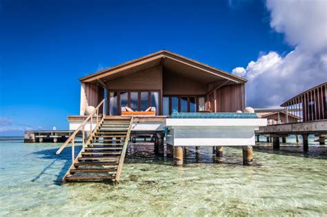 Island living at its finest. Private villas in the Maldives feature staircases leading into ...