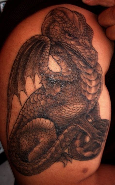 Baby Dragon Tattoos | baby dragon tattoo best tiger tattoo tattoos with flowers