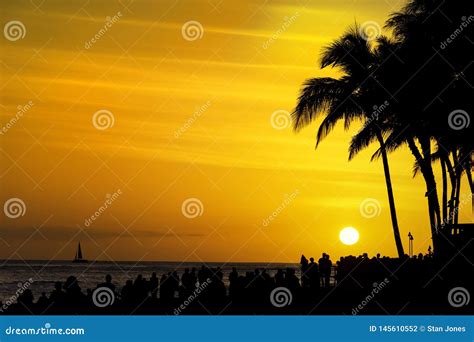 Crowds of Tourists Gather To Watch the Sunset on Waikiki Beach Honolulu Oahu Hawaii USA Stock ...