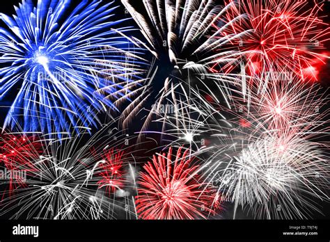 Blue white and red fireworks background Stock Photo - Alamy