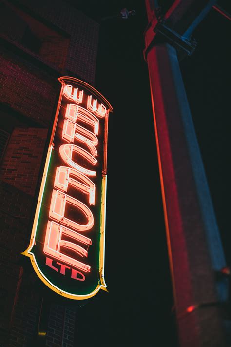 Neon Light Signage on the Building · Free Stock Photo