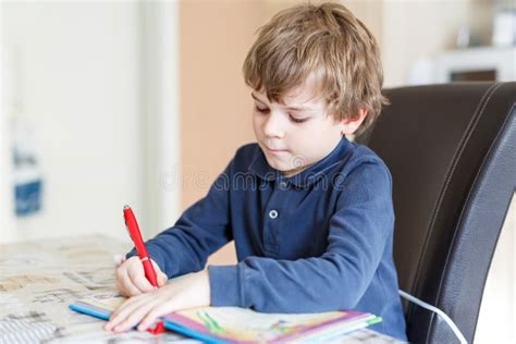 Preschool Kid Boy at Home Making Homework Writing Letters with Colorful Pens Stock Photo - Image ...