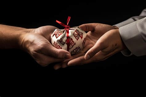 Premium Photo | Hands exchanging Martisor symbols as a gesture of friendship