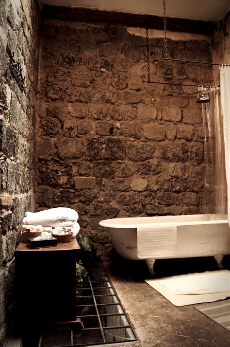 Rock Wall bathroom in Ecuador | Rock wall, Amazing architecture, Cabin bathrooms