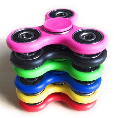 Fidget spinners 'soothing' for autistic children and blanket ban in ...