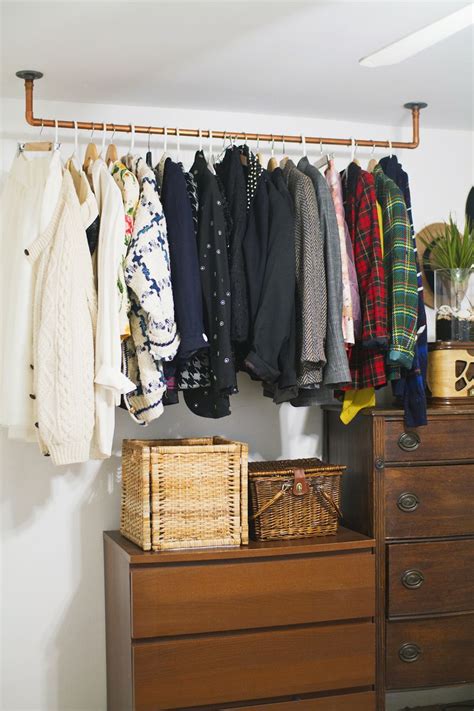 Hanging Copper Pipe Clothing Rack DIY - A Beautiful Mess