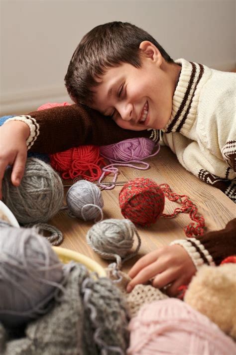 Child Boy is Learning To Knit. he is Dreaming and Closing Eyes Stock Photo - Image of craft ...