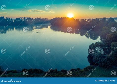 Early Morning, Sunrise Over the Lake Stock Photo - Image of lake, mist: 149433758