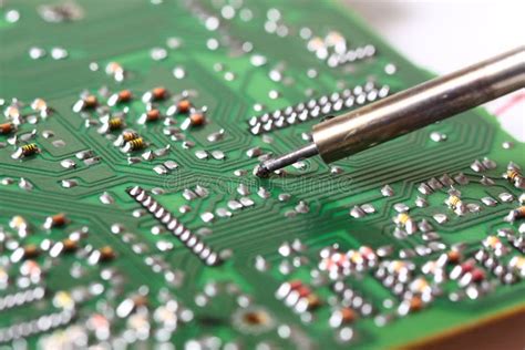 Soldering a circuit board stock photo. Image of industrial - 17971036