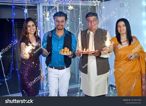 Indian Happy Family Celebrating Festival Diwali Stock Photo 2376610189 ...