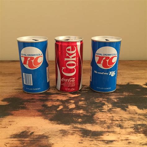 Trio of vintage pop cans