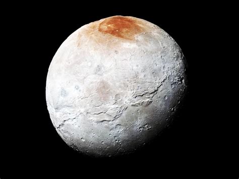 How Pluto's Moon Charon Got Its Dusty Red Cap | WIRED