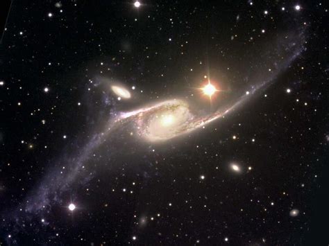 The largest known spiral galaxy NGC 6872 which is about 212 million light-years away in the ...