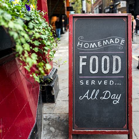 "Sign Outside A Restaurant Says " Homemade Food Served All Day "" by Stocksy Contributor "Sky ...