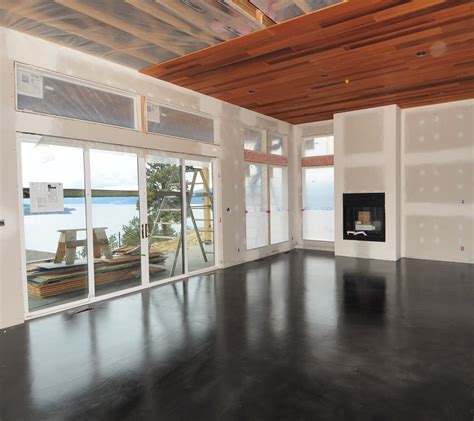 MODE CONCRETE: Black Acid Stained Modern Concrete Floor - created in the Okanagan