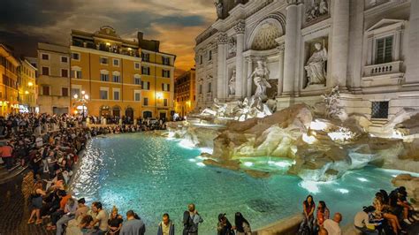 Visit the Trevi Fountain at the Piazza di Trevi (Rome)