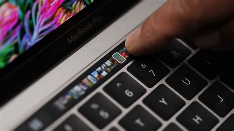 Apple is bringing a touchscreen to the MacBook Pro’s keyboard — and it looks really cool - Vox