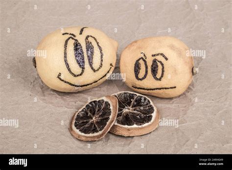 funny lemons with happy and sad expressions Stock Photo - Alamy