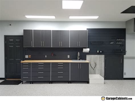 All Dream Garages Must Include A Garage Workbench With Storage - GarageCabinets.com