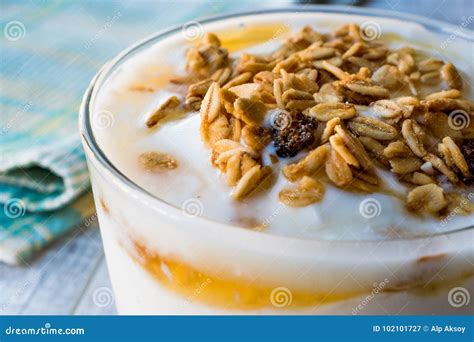 Greek Yogurt with Honey and Granola Stock Image - Image of background, health: 102101727