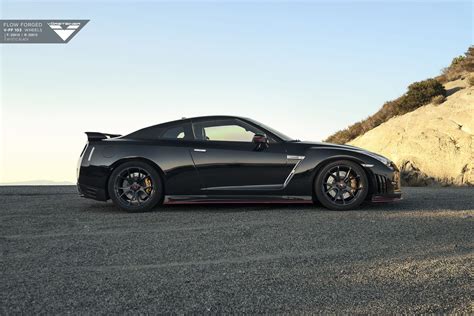 Iconic Nissan GT-R: Black and Fitted with Custom LED Headlights — CARiD.com Gallery