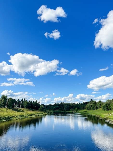 Premium Photo | Beautiful natural scenery of river and blue sky in ...