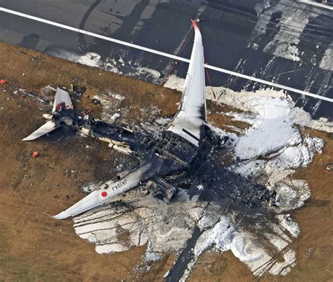 Runway warning lights were broken at time of Japan Airlines plane fire ...