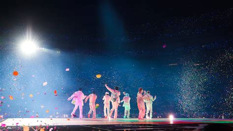 Download BTS Concert In Their Dynamite Performance Wallpaper | Wallpapers.com