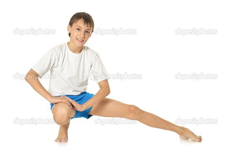 Boy exercising yoga — Stock Photo © aletia #47820835