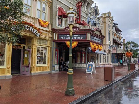 PHOTOS: Main Street, U.S.A. Lampposts Begin to Receive Gold Accents for Walt Disney World's 50th ...