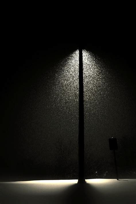 Street lamp at night snowing Photograph by Twoblueowls Photography - Pixels