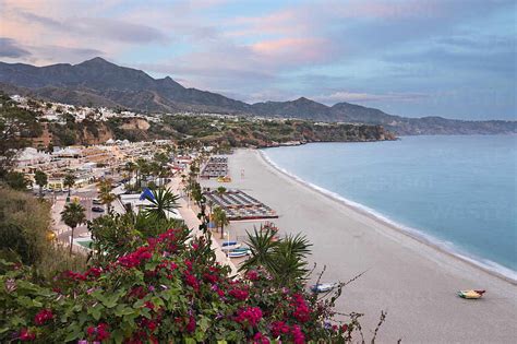 Sunset view over Nerja Playa Burriana beach, Nerja, Malaga Province, Costa del Sol, Andalucia ...