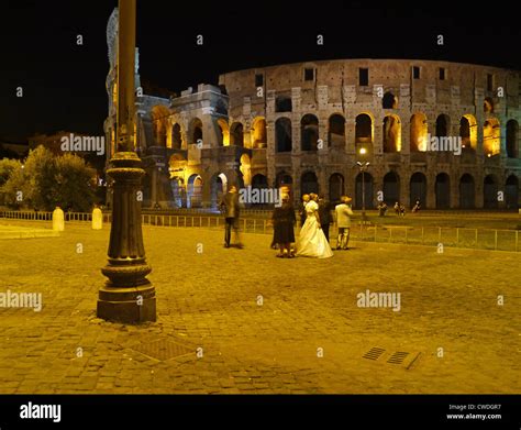 Roman Coliseum illuminated at night Stock Photo - Alamy