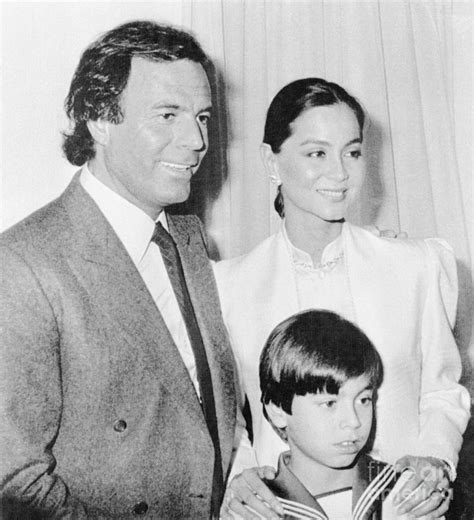 Singer Julio Iglesias With Wife And Son by Bettmann