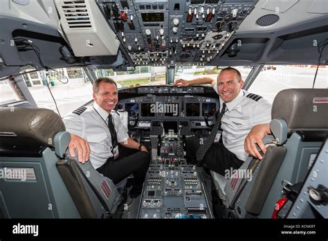 Interior view of a 737 cockpit and its two pilots,The Comox Valley Stock Photo - Alamy