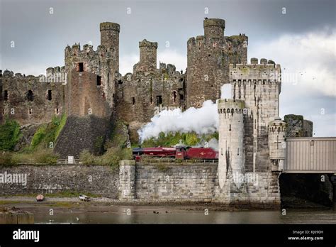 Conwy castle. steam train Galatea Stock Photo - Alamy