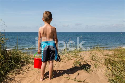 Boy With Beach Toys Stock Photo | Royalty-Free | FreeImages