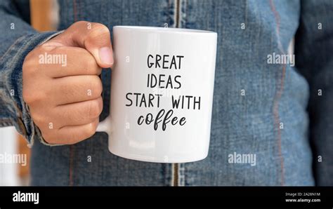 Inspirational quote on coffee mug - Great ideas start with coffee Stock Photo - Alamy