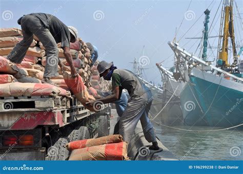 Indonesian Port Workers Unload a Ship with a Cement Bags Cargo Editorial Stock Photo - Image of ...