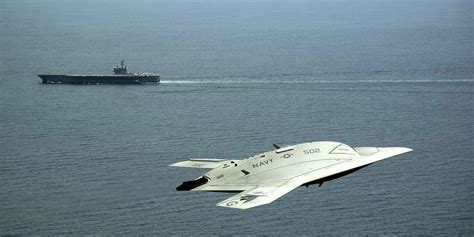 Here's the Navy's sleek new stealth-fighter drone in action