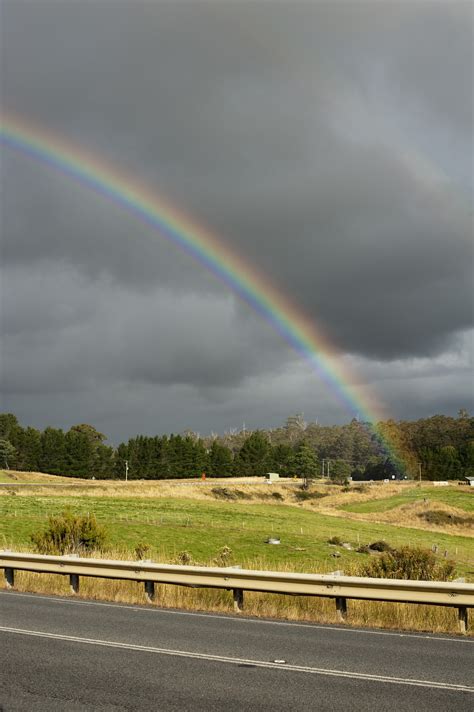 Free Stock Photo 10941 Colorful rainbow in a country field | freeimageslive