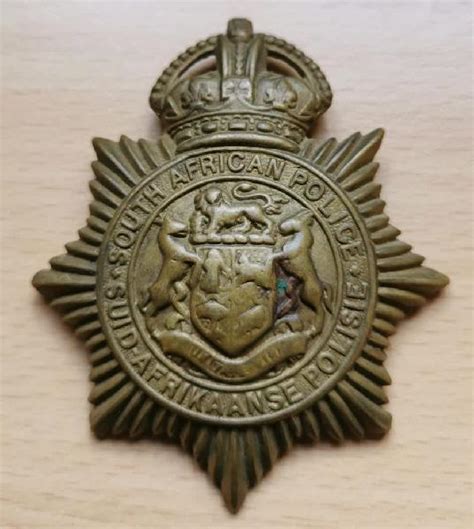 Sa police brass helmet badge s-type worn 1931-1957 (co1901) in South Africa | Clasf leisure