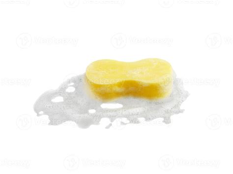 Yellow cleaning sponge in soap foam on white background isolation ...